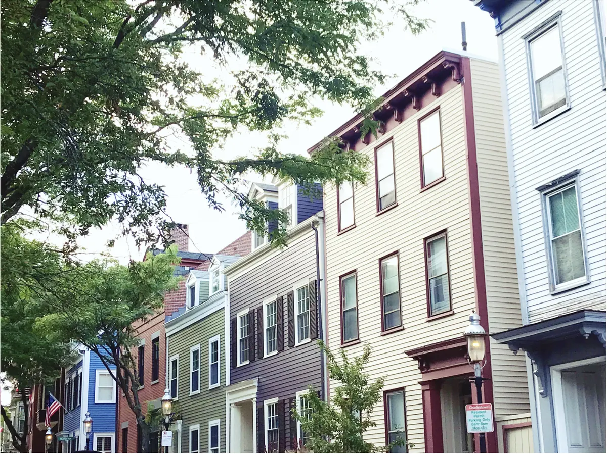 Historic pre-war homes on a tree-lined street near Quincy, Massachusetts
